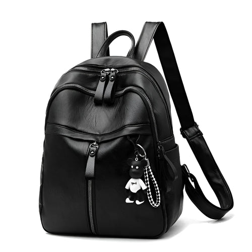 Black soft-surface pu leather backpack with double straps and luggage strap, showing main compartment.
