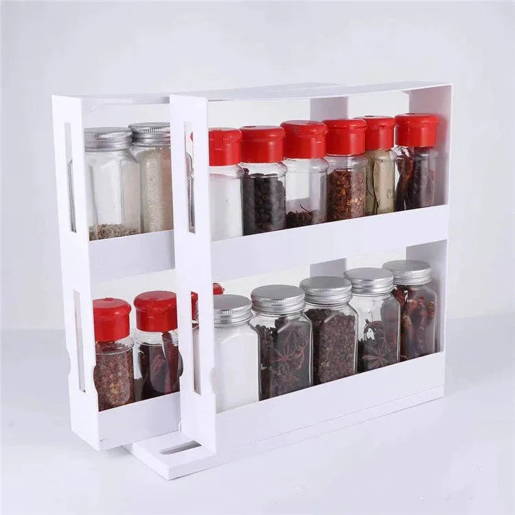 White double rotating 2-tier plastic spice rack on countertop with jars