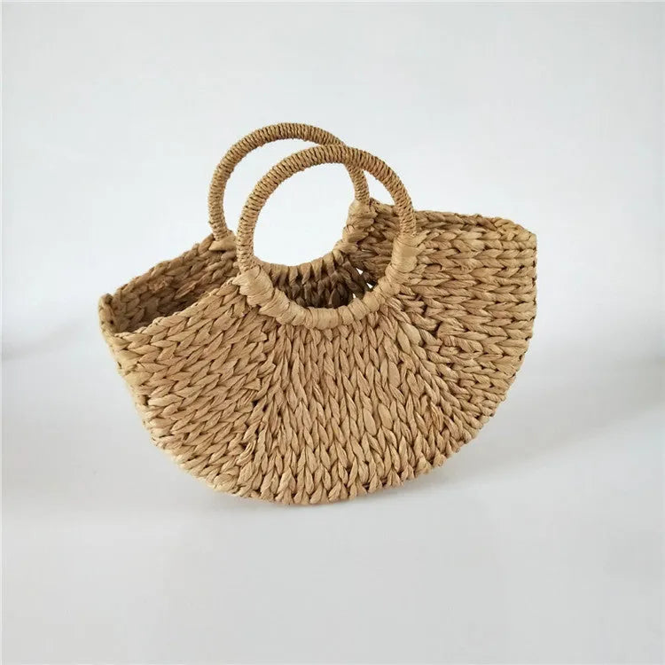 Rattan woven half-round women's handbag in khaki with 15 cm handle and 39 cm mouth width.