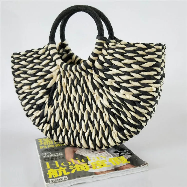 Rattan woven half-round women's handbag in khaki with 15 cm handle and 39 cm mouth width.