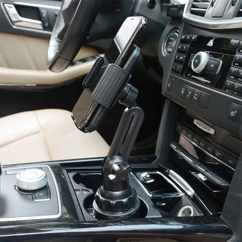 Black universal car phone holder showing 360-degree rotation and adjustable height on a dashboard.
