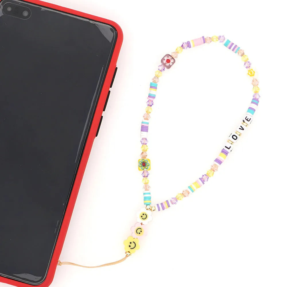 Handmade bohemian smiley face phone chain with soft clay, crystal and glass beads, 28.5cm outer circumference plus 5cm lanyard.