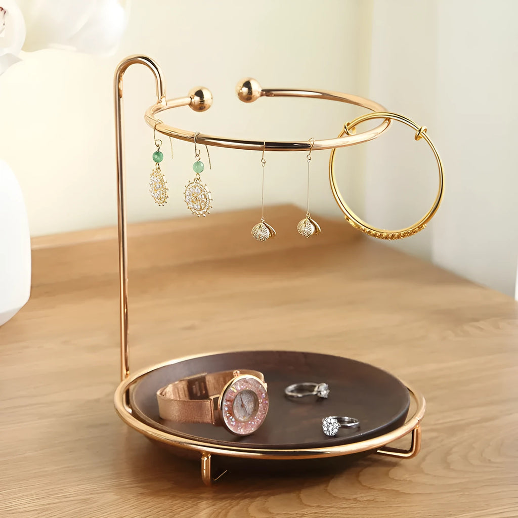 Walnut solid wood ring jewellery storage tray with electroplated iron accents on a flat surface