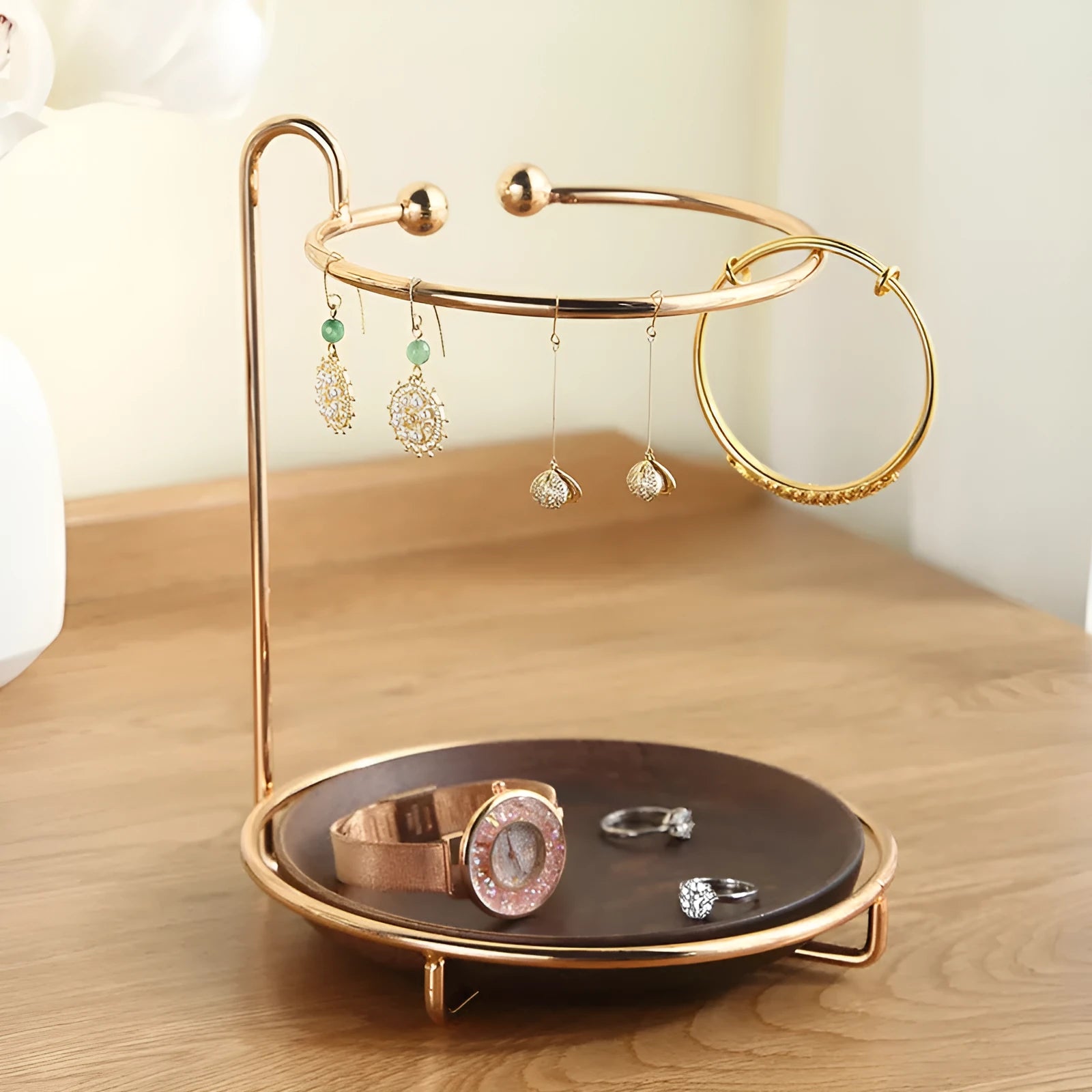 Walnut solid wood ring jewellery storage tray with electroplated iron accents on a flat surface