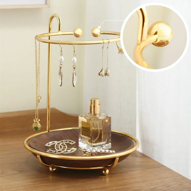 Walnut solid wood ring jewellery storage tray with electroplated iron accents on a flat surface