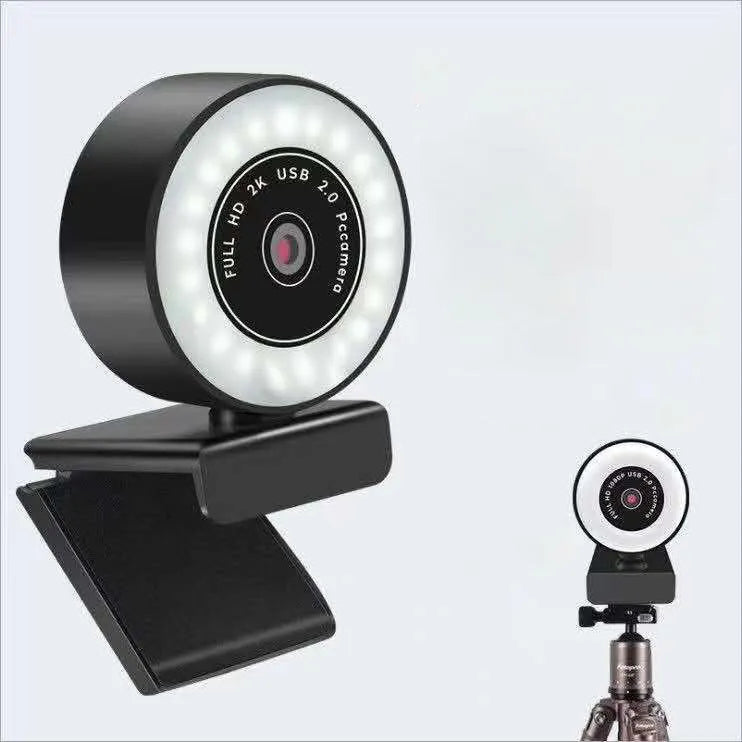 Black USB desktop webcam with a built-in fill light ring around the lens.