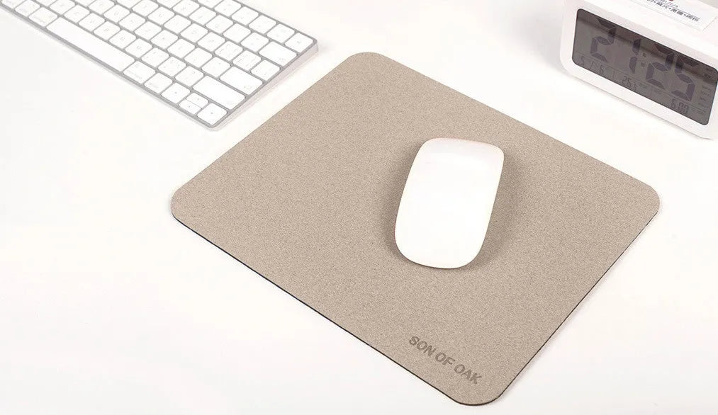Cork portable mouse pad in green colour, 210x260x2.5mm size, lying flat on a desk surface