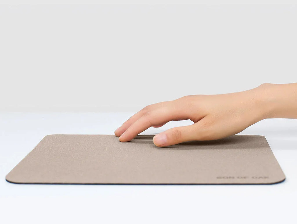 Cork portable mouse pad in green colour, 210x260x2.5mm size, lying flat on a desk surface
