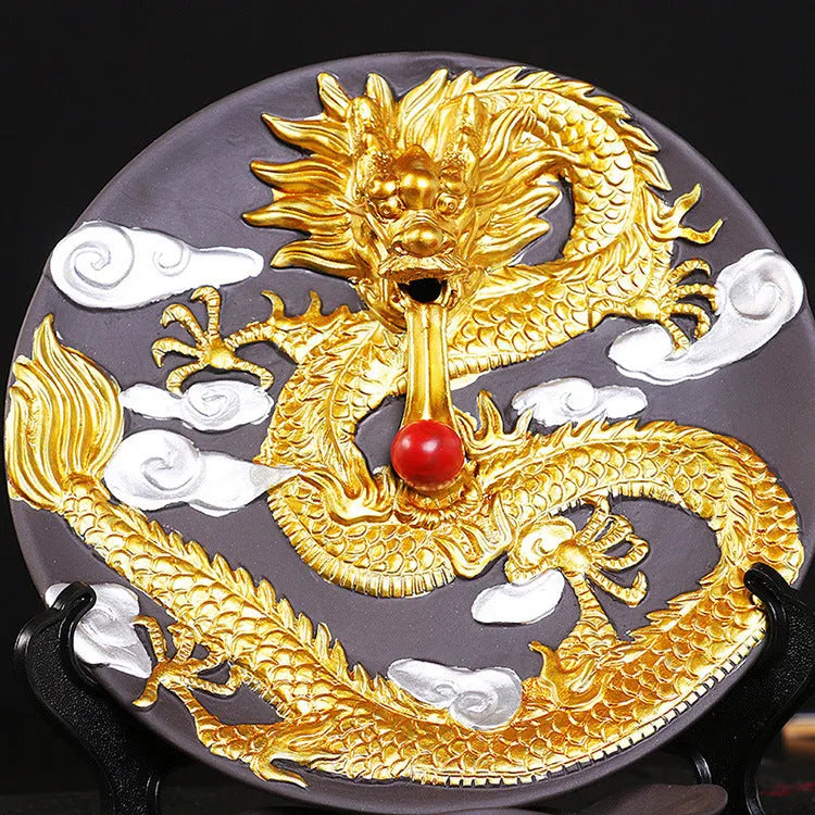 Ceramic backflow incense burner in Yellow Golden Dragon Plate colour on a table