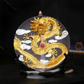 Ceramic backflow incense burner in Yellow Golden Dragon Plate colour on a table