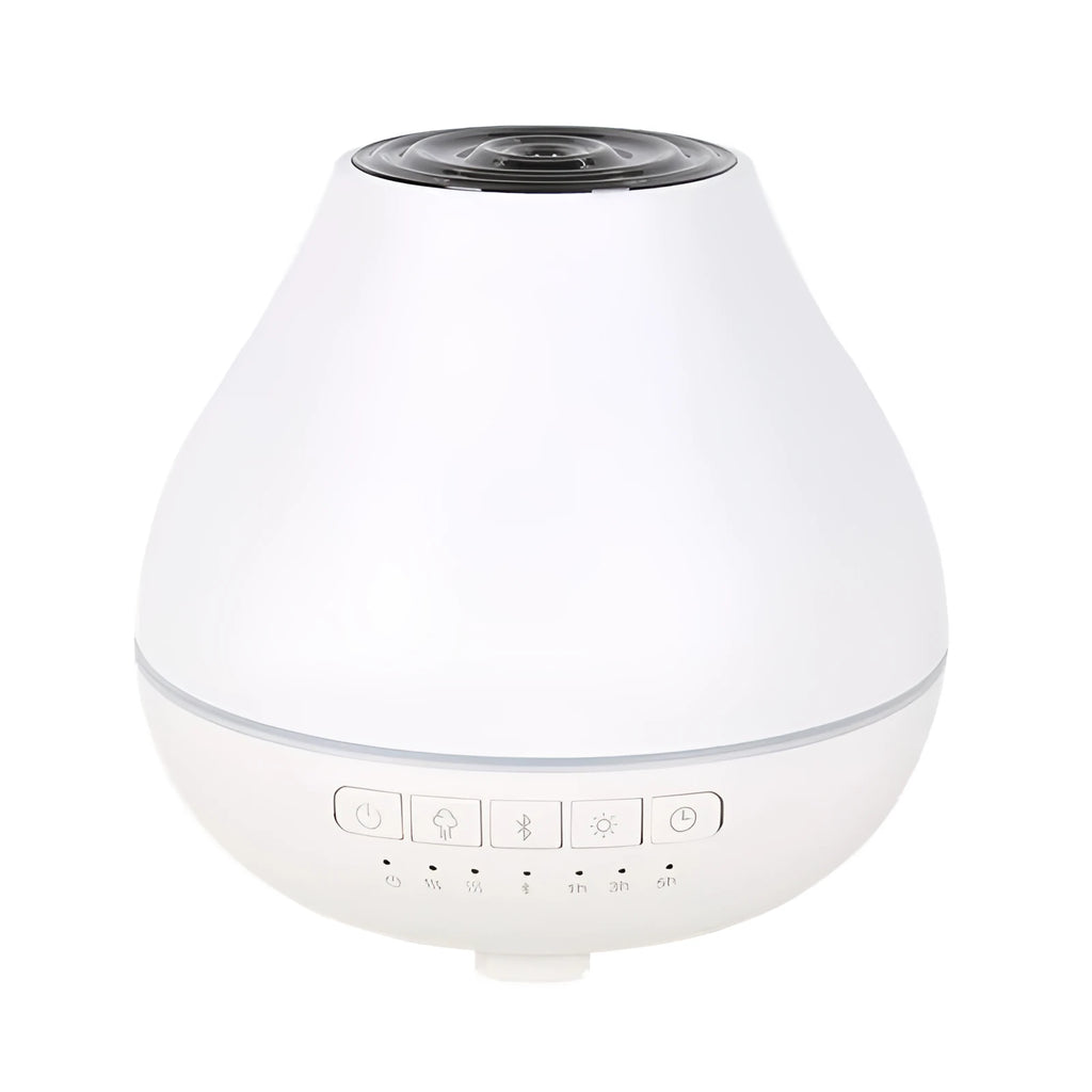 White round Bluetooth aroma diffuser with night light on wooden table, showing mist outlet and water tank.