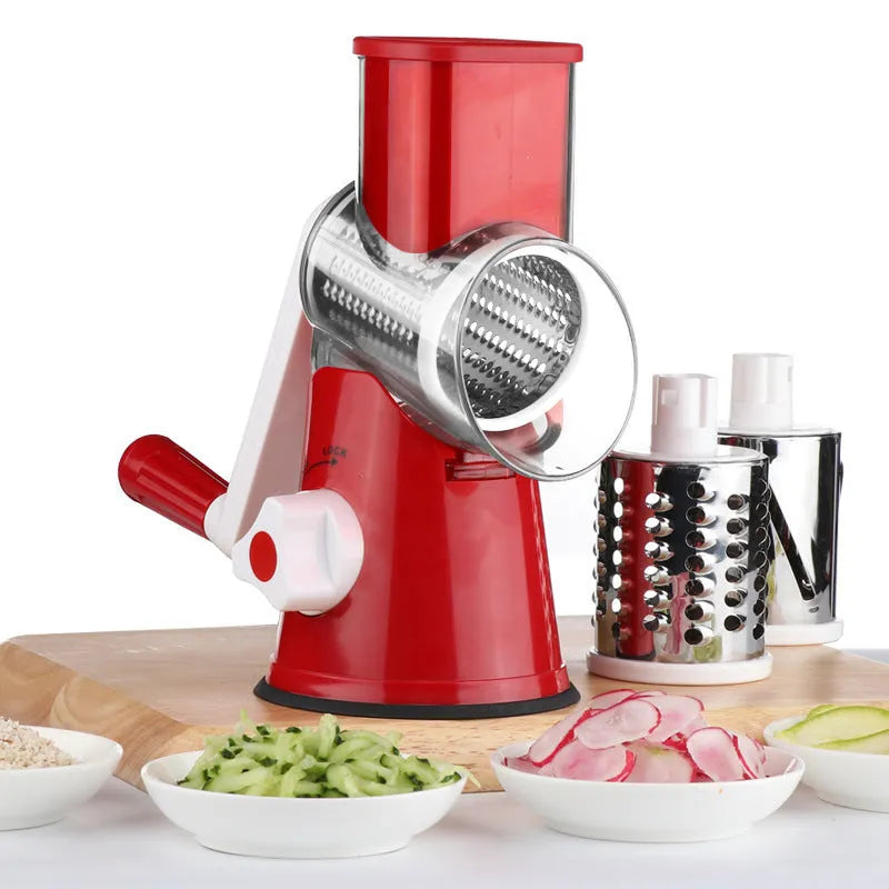 Blue multi-function vegetable chopper with suction cup base on a kitchen counter.