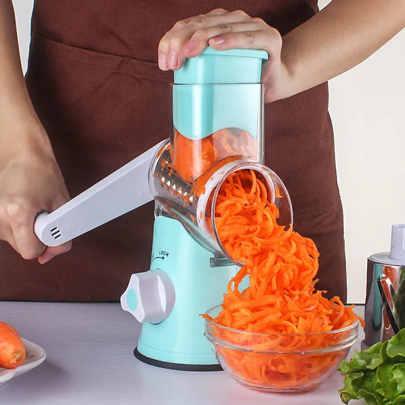 Blue multi-function vegetable chopper with suction cup base on a kitchen counter.