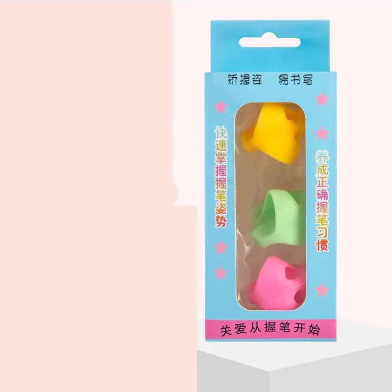 A soft, translucent silicone pencil grip with three moulded finger guides for a child's thumb, index, and middle finger.