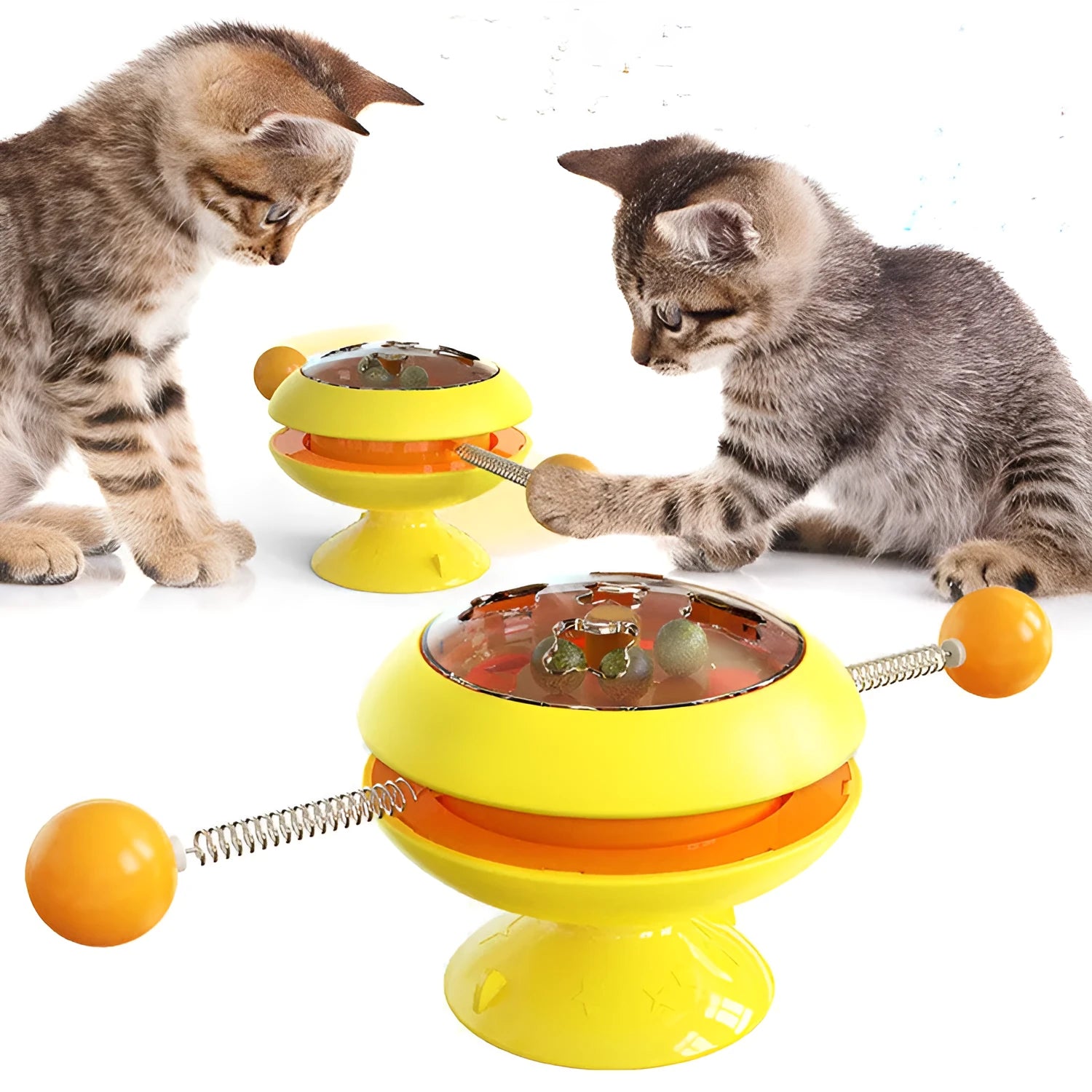 Rotating cat toy with coloured turntable, catnip balls, and suction cup base for interactive indoor play