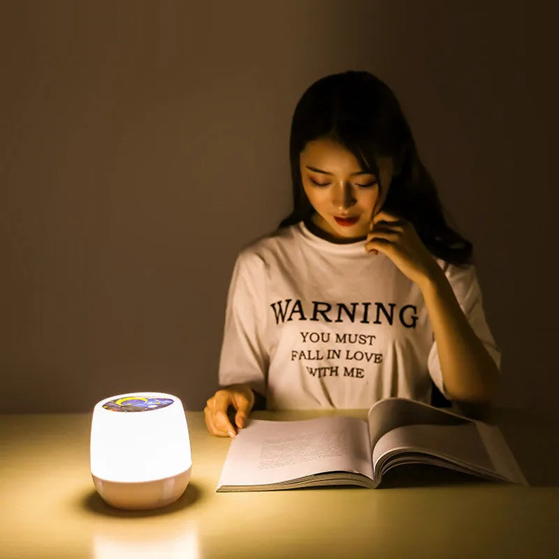 Pruixin projector night light showing rotating star pattern projection on a bedroom wall.