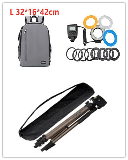 Aluminium camera tripod extended to 1.3m with hydraulic head, mobile phone holder, and Bluetooth remote on a table.