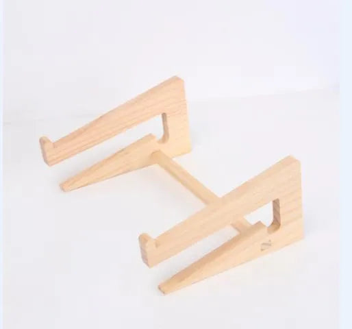 Solid wood notebook computer stand with raised cooling base on a desk, six style options for laptops