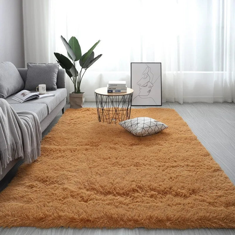 Nordic style plush rectangle carpet with anti-slip backing in a light colour on a wooden floor
