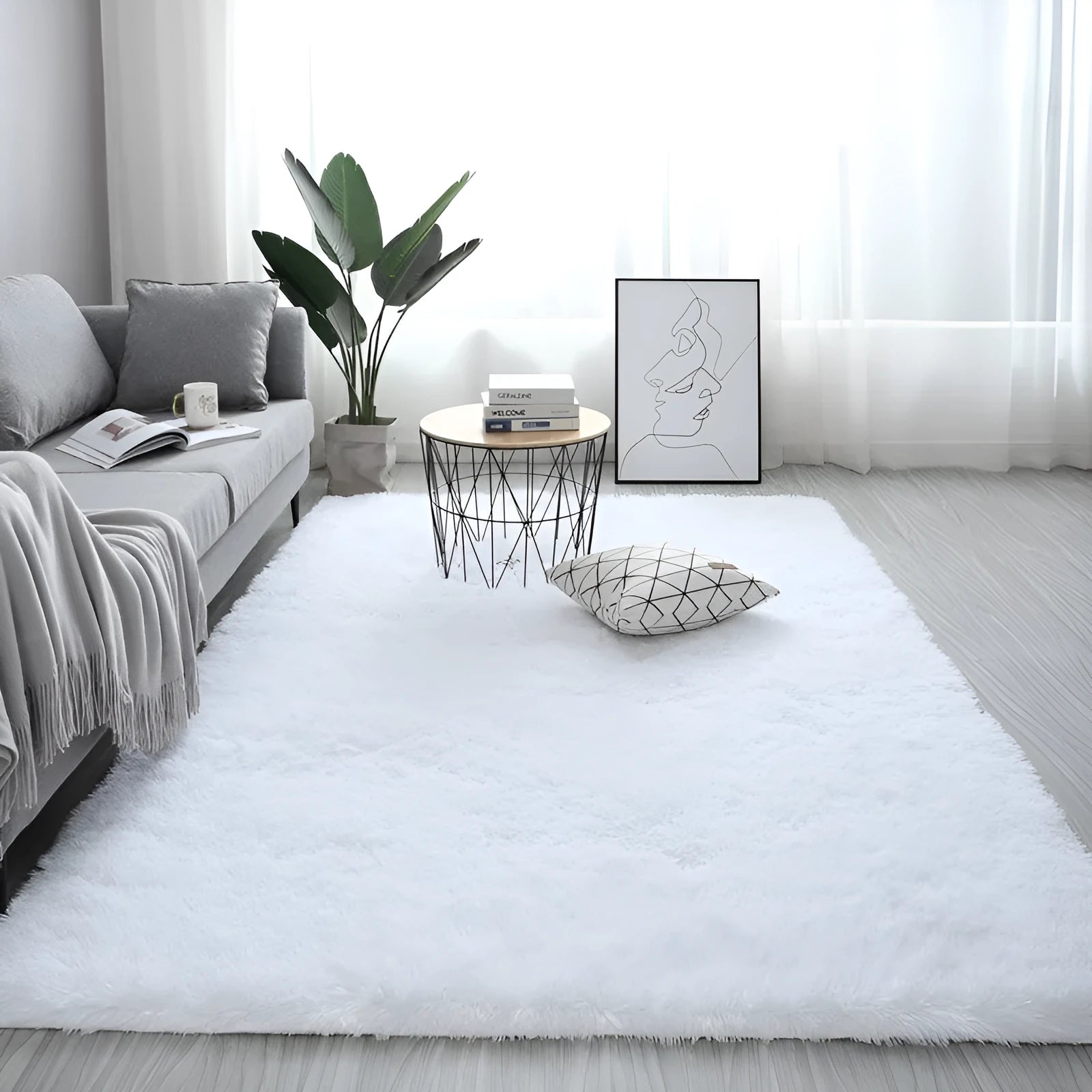 Nordic style plush rectangle carpet with anti-slip backing in a light colour on a wooden floor