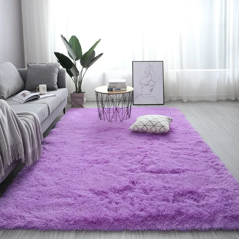 Nordic style plush rectangle carpet with anti-slip backing in a light colour on a wooden floor