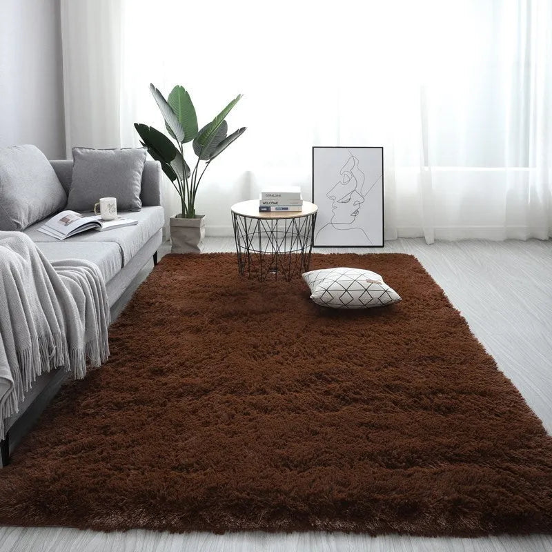 Nordic style plush rectangle carpet with anti-slip backing in a light colour on a wooden floor