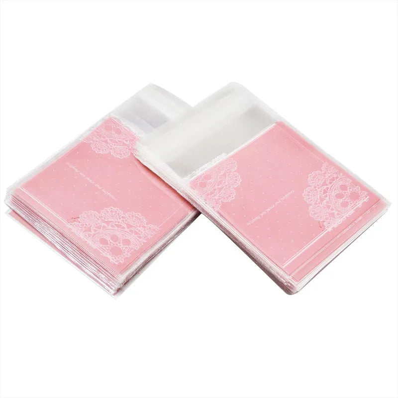 Pink self-adhesive plastic packaging bag with clear window and UV printing, showing 7x7cm dimensions.