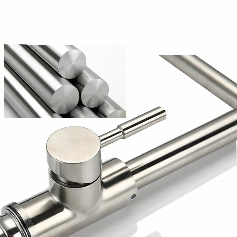 Silver stainless steel kitchen tap with rotating spout and dual hot cold handles