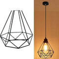 Black Nordic-style iron chandelier with multiple arms, showing its compact retractable design for ceiling hanging.