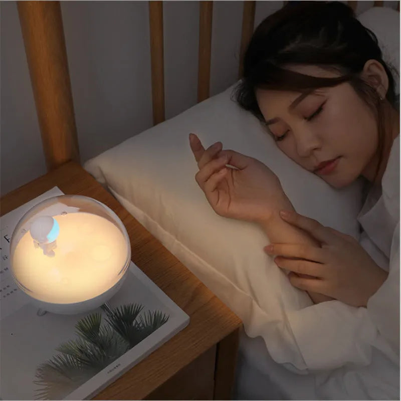 Cartoon-themed USB LED night light with plastic shade showing white and blue lighting options