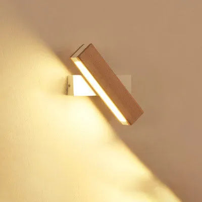 Modern wooden adjustable LED wall lamp in black or white with directional lighting bar