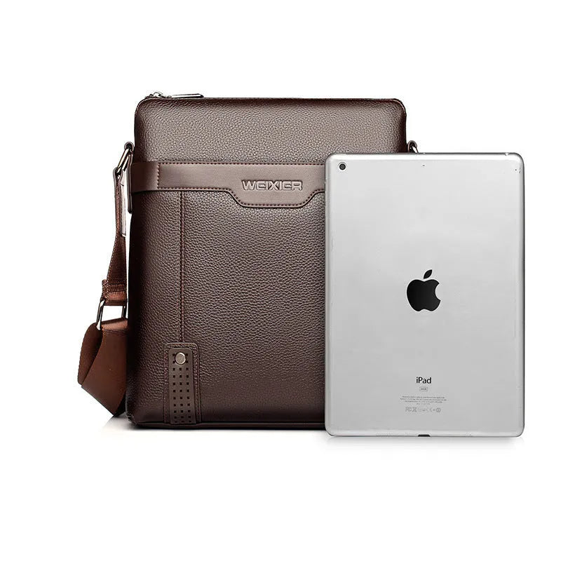 Men's black casual shoulder bag made of soft PU leather with a single strap and zipper.