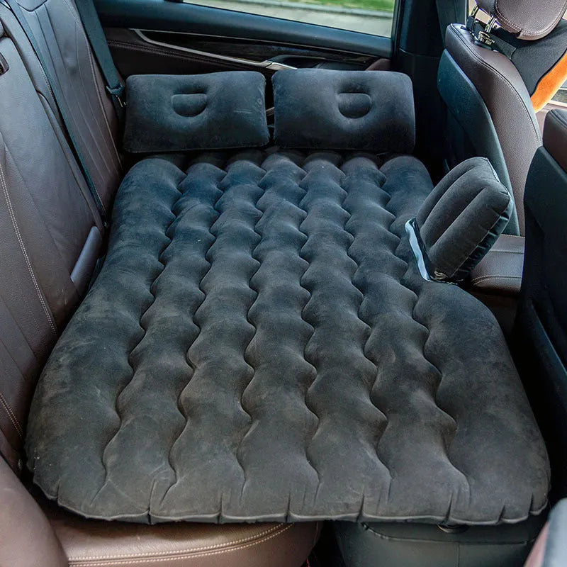 Blue car inflatable mattress with two pillows folded for storage, 135x70cm