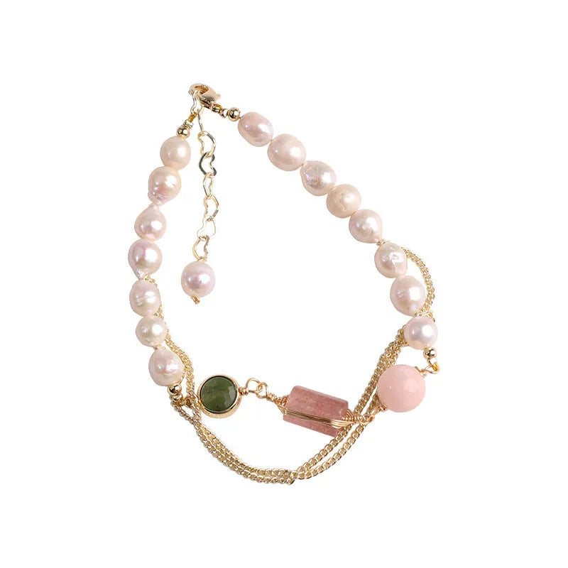 Women's pink freshwater pearl bracelet with strawberry crystal charm geometric design