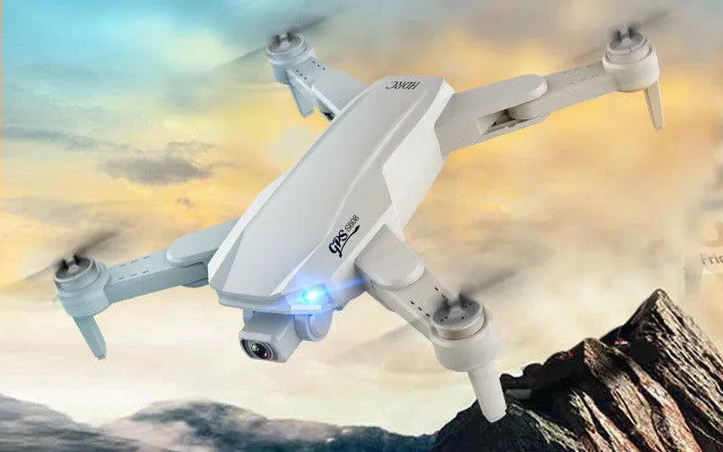 S608 PRO quadcopter in orange with dual cameras, foldable propellers, and GPS module on black background
