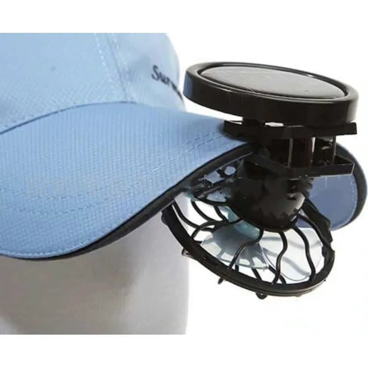 Black clip-on solar fan panel for outdoor cooling during camping and fishing.