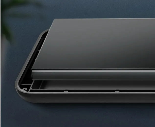 Black ultra-thin back clip battery attached to an iPhone 12, showing its slim profile and clip design.