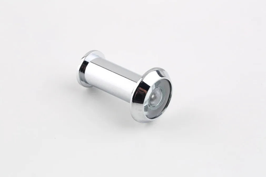 LCD digital door peephole viewer with indoor monitor and outdoor camera for wireless home security.