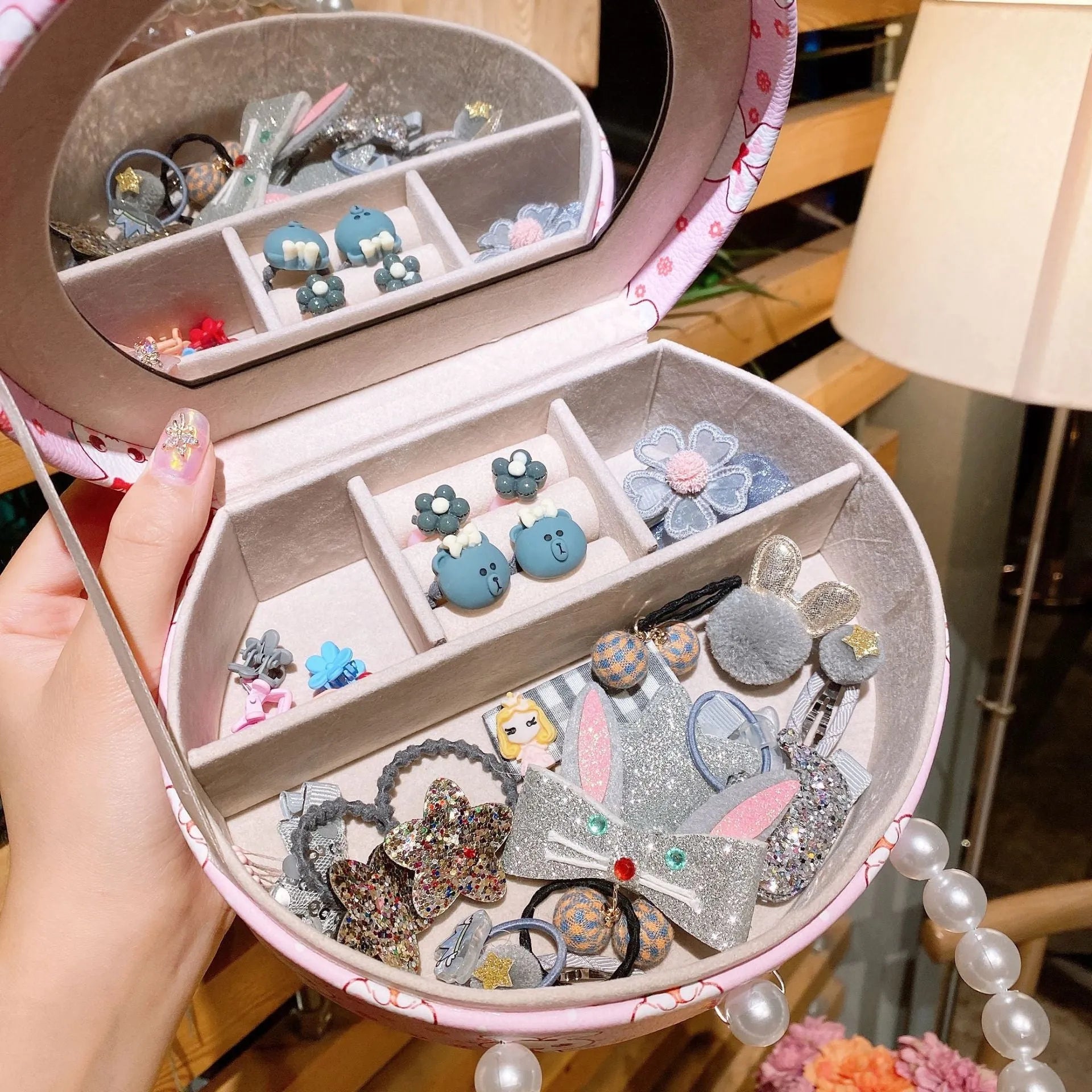 Cocoli 26-piece princess-themed hair clip set for girls in a gift box with cartoon character designs.