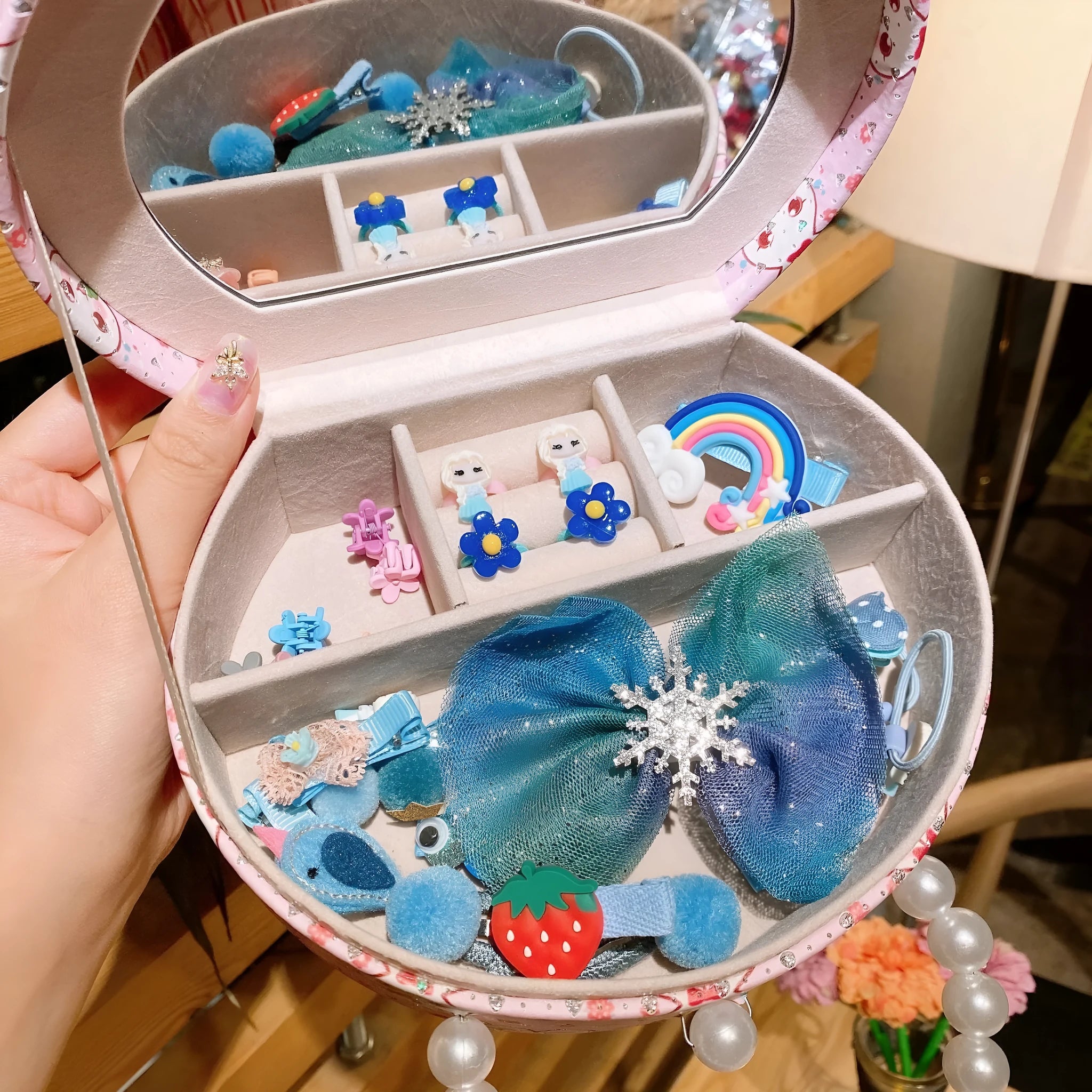 Cocoli 26-piece princess-themed hair clip set for girls in a gift box with cartoon character designs.