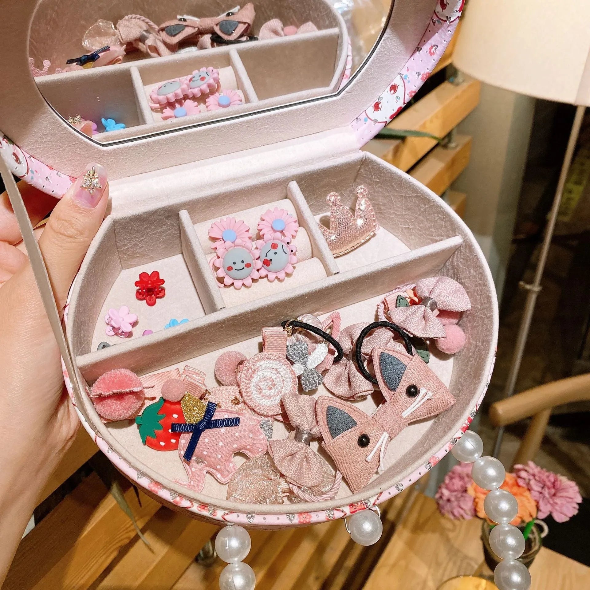 Cocoli 26-piece princess-themed hair clip set for girls in a gift box with cartoon character designs.