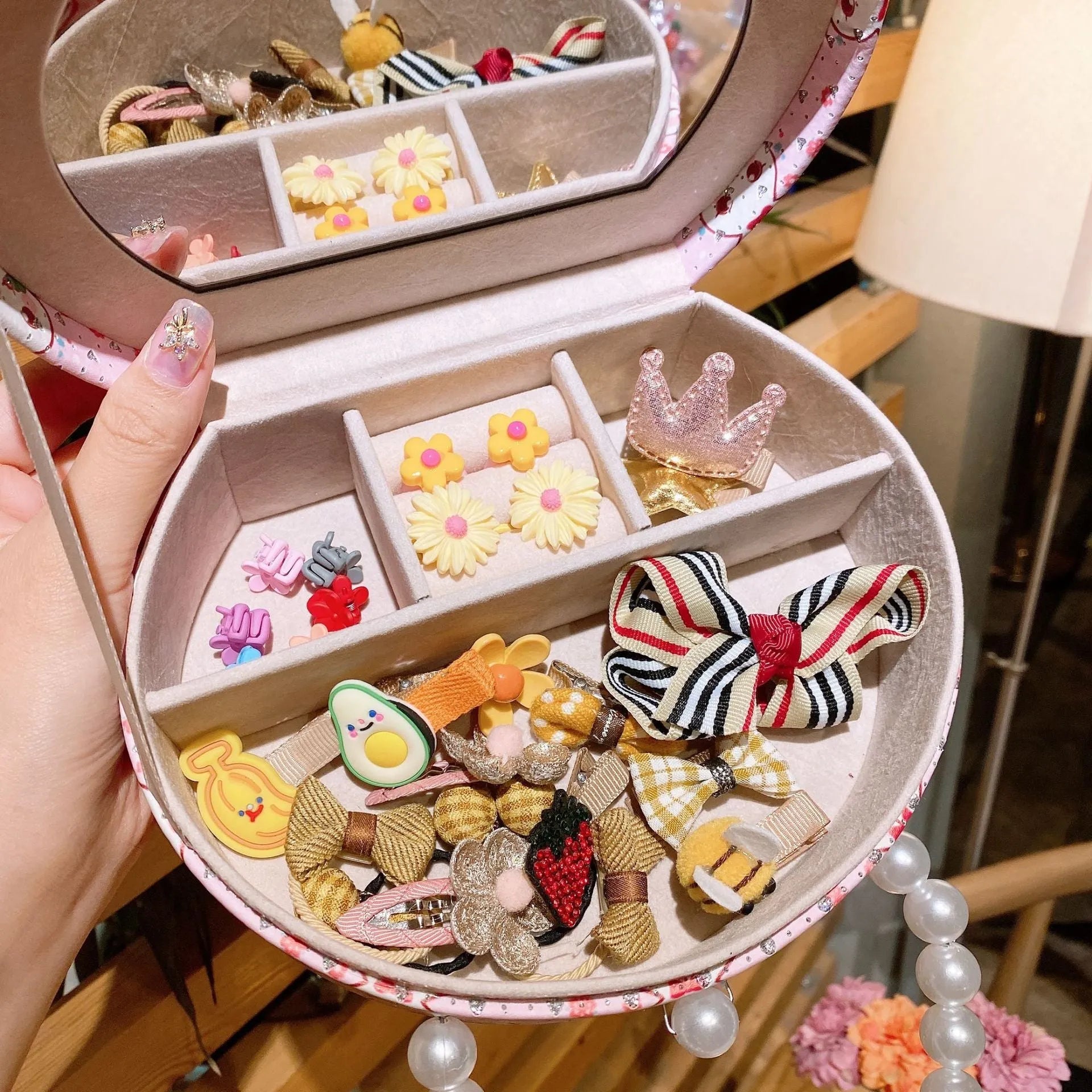 Cocoli 26-piece princess-themed hair clip set for girls in a gift box with cartoon character designs.