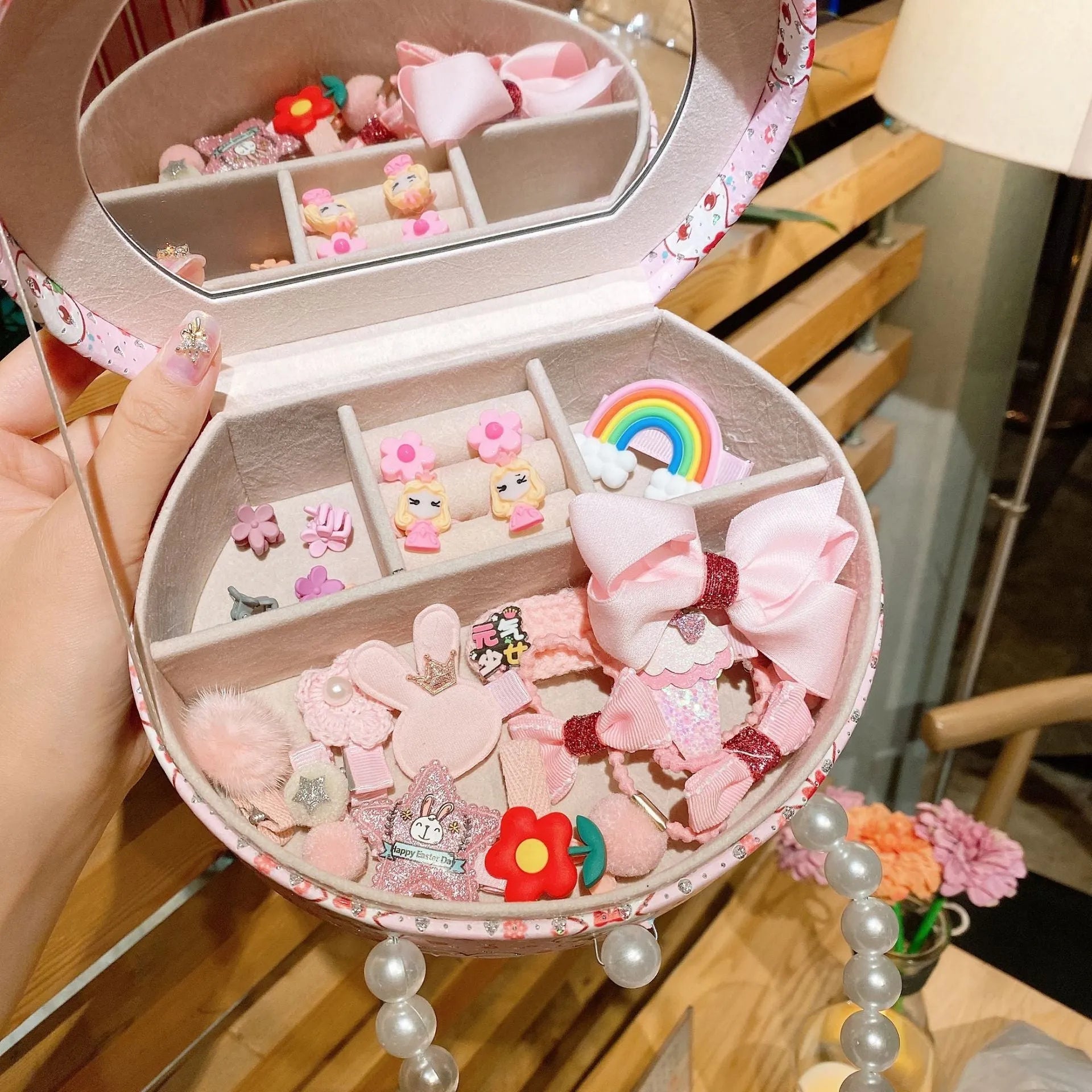 Cocoli 26-piece princess-themed hair clip set for girls in a gift box with cartoon character designs.