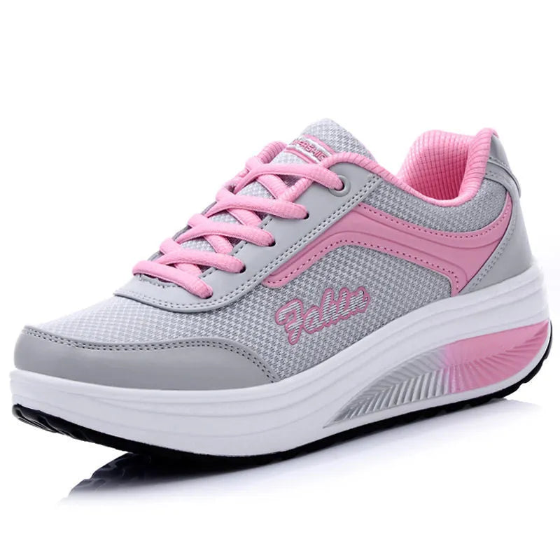 Women's low-heel sports shoe in a selection of colours including grey powder and yellow.