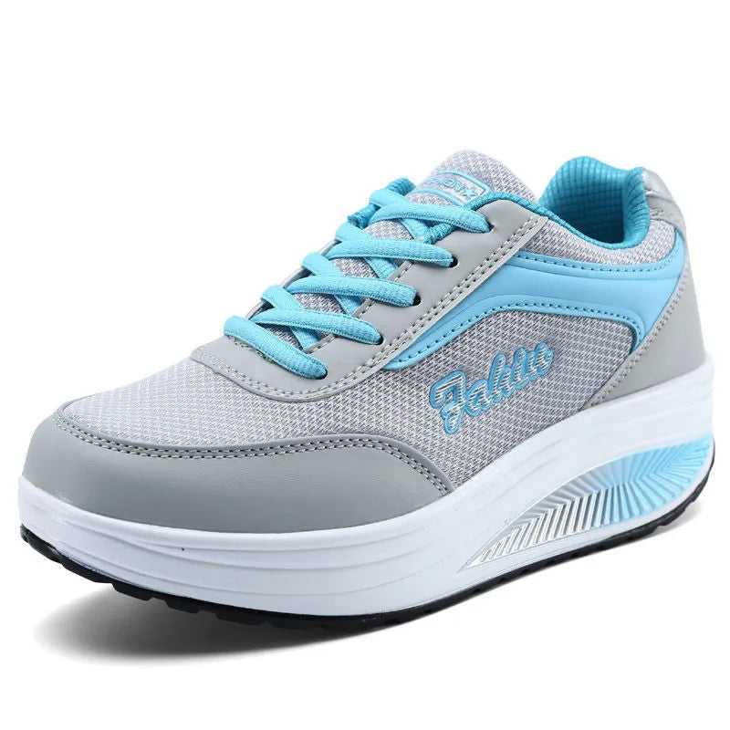Women's low-heel sports shoe in a selection of colours including grey powder and yellow.