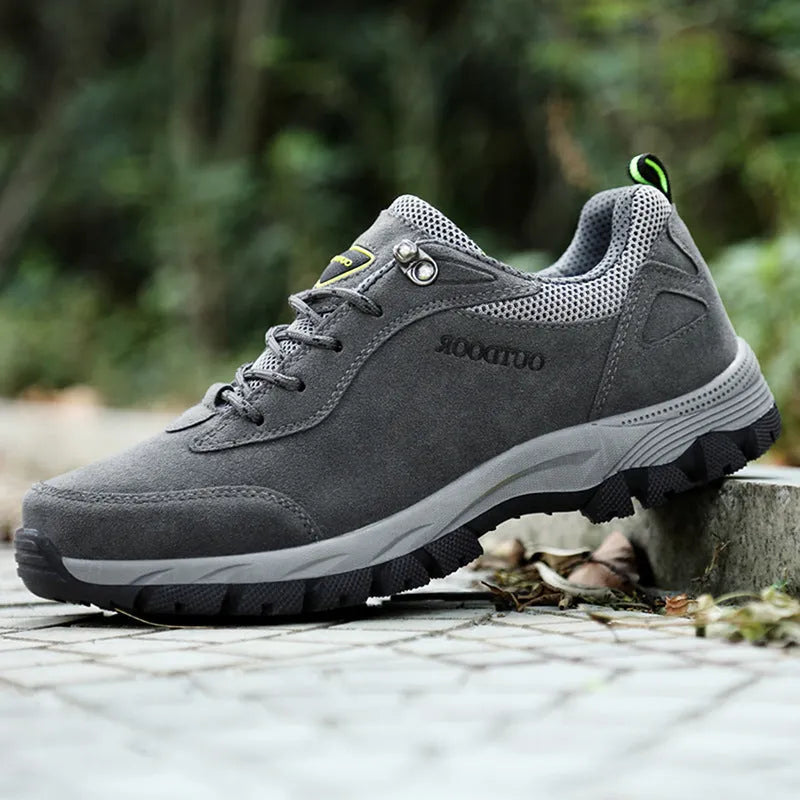 Men's low-cut outdoor hiking shoes in Army Green, showing the mesh lining and leisure design.