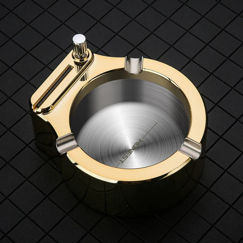 Large blue metal ashtray with integrated sliding stick permanent match lighter and three cigarette slots.