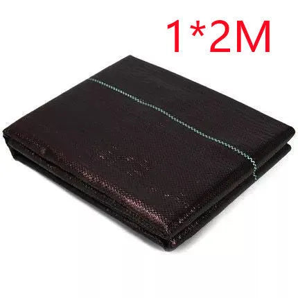 Black plastic weed control cloth laid flat showing composite woven texture and rectangular shape