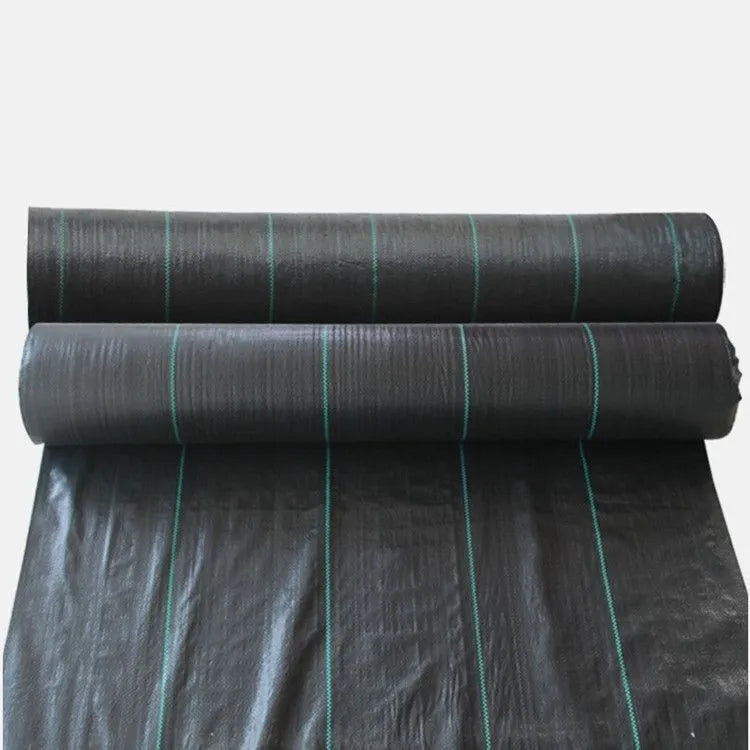 Black plastic weed control cloth laid flat showing composite woven texture and rectangular shape