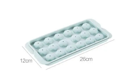 Sky blue 3D round ice ball mould tray with 18 grids next to a pink tray with 33 grids.